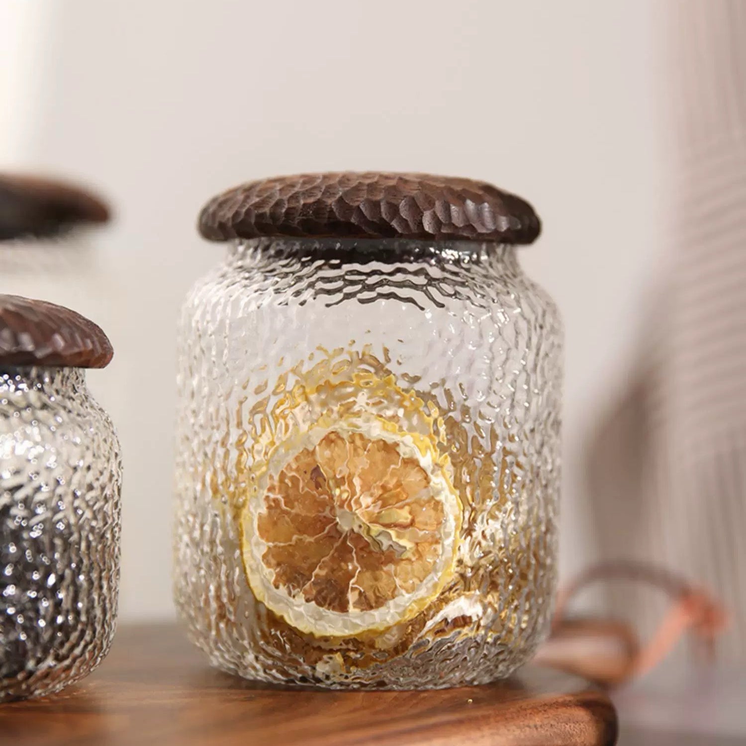 Dark wood Haven Black Walnut Hammered Seal Glass Container close-up