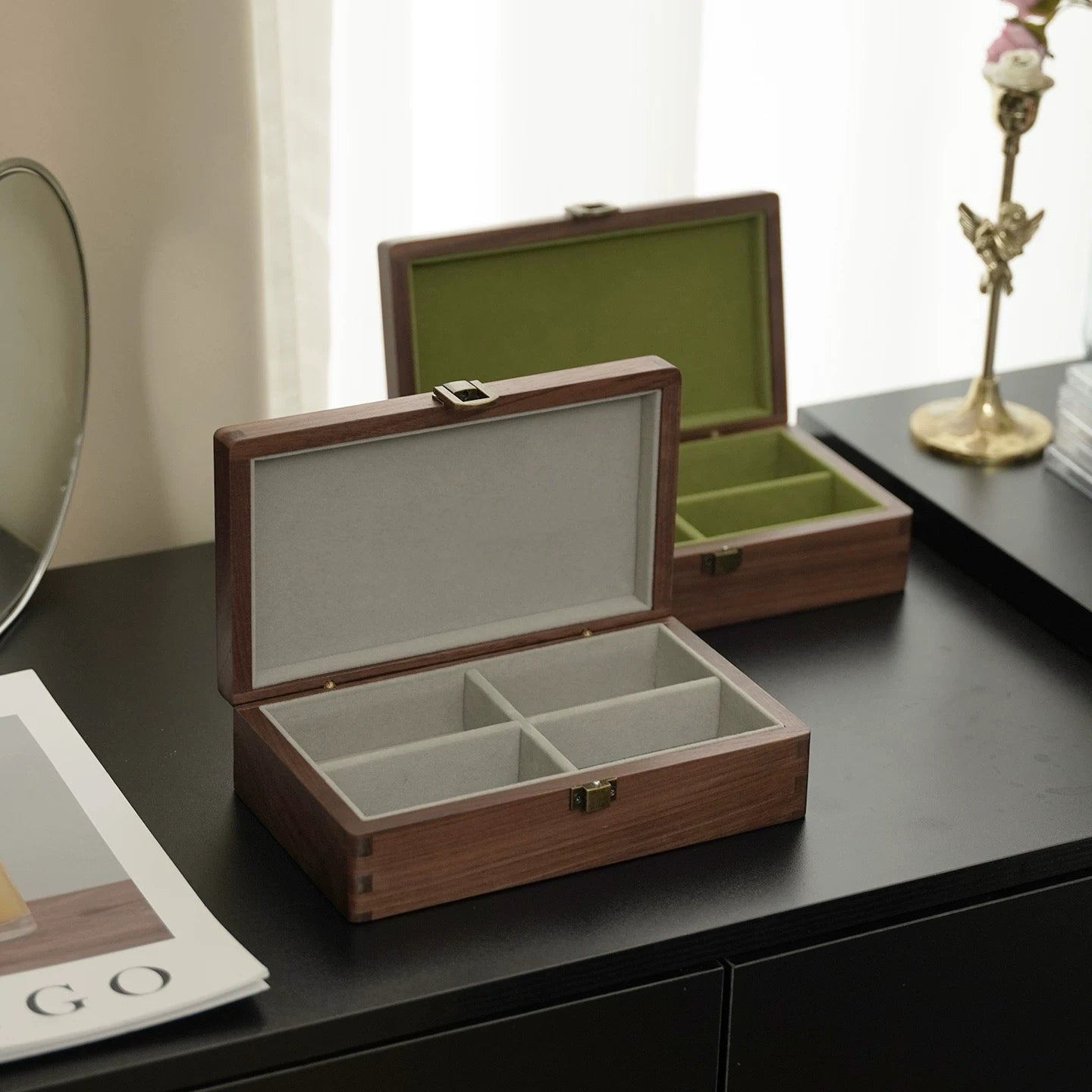 Emerald walnut jewelry box on wooden tabletop