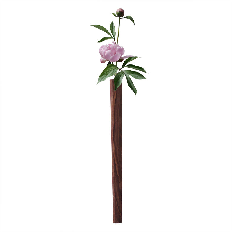 Minimalist wall-mounted vase made of black walnut