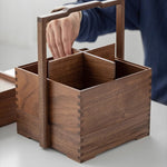 Portable walnut tea storage box placed in tea ceremony setup