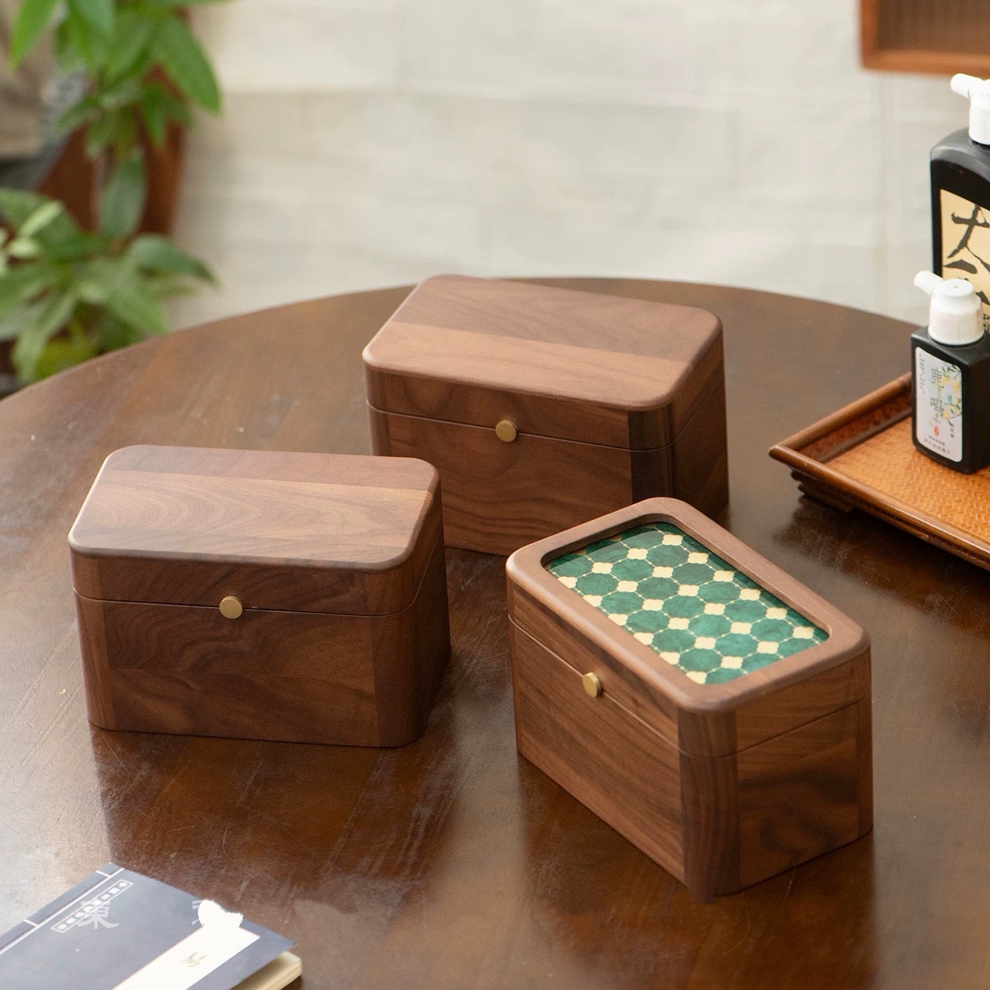 Set of colorful glass bangles neatly arranged in walnut box