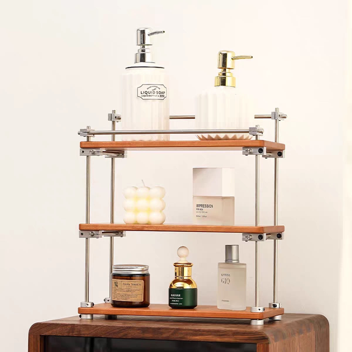 Walnut wood multi-level storage rack on shelf